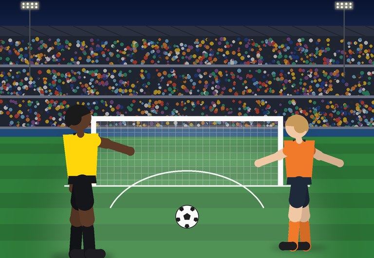 The referee points to the penalty spot